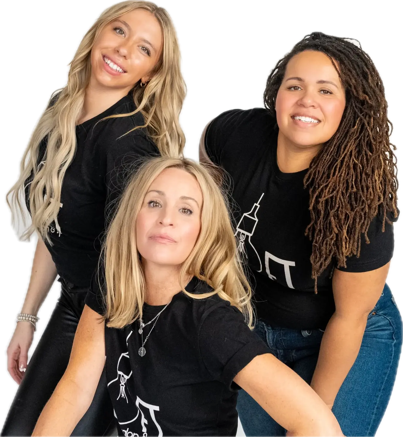 Three of the Loft crew leaning into the frame, laughing