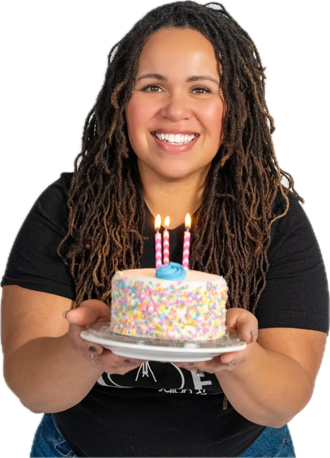Loft stylist holding a sprinkle birthday cake